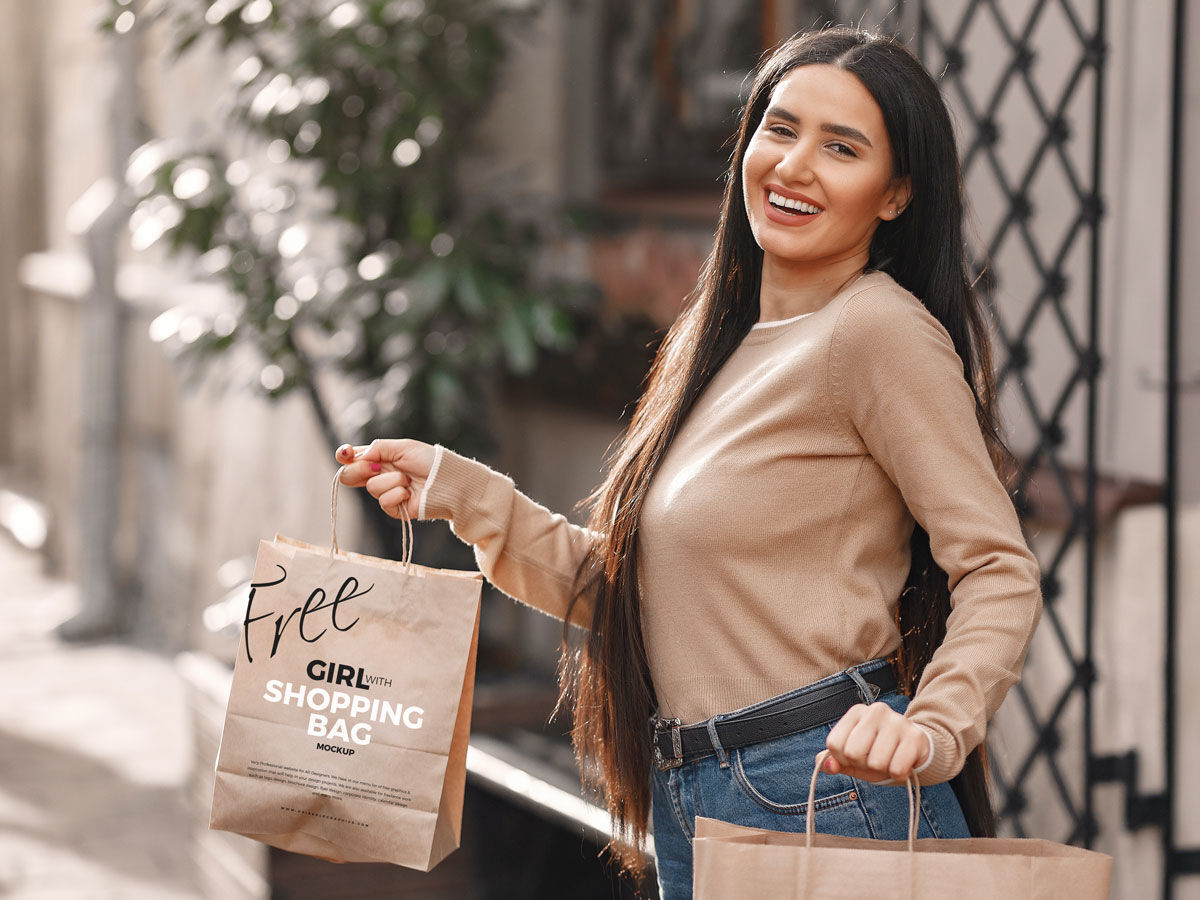 Girl holding shopping bags hot sale