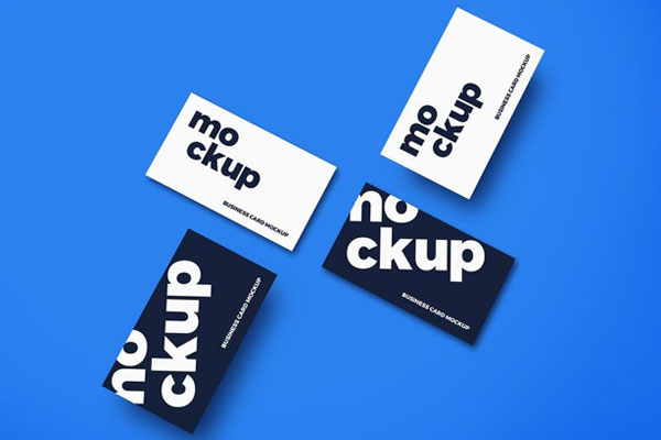 Mockup Showcasing Overhead View of Four Scattered Business Cards FREE PSD
