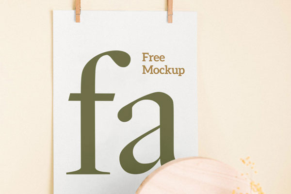 Mockup Showing a Poster Hanging on The Wall with Two Clips FREE PSD