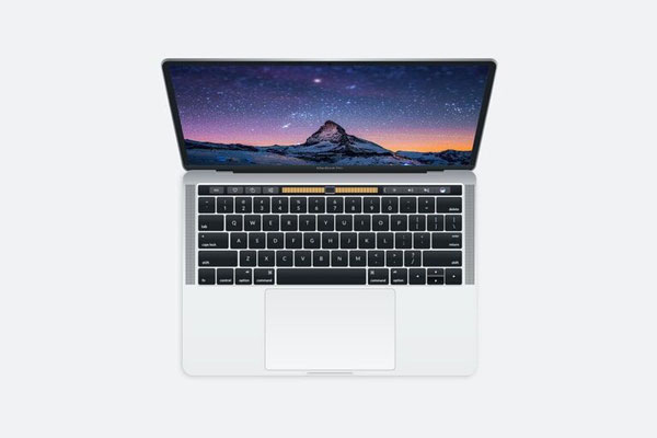 Mockup Showing an Overhead Shot of MacBook Pro FREE PSD