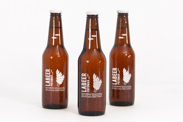 Mockup Showing Three Standing Beer Bottles with Metallic Caps FREE PSD