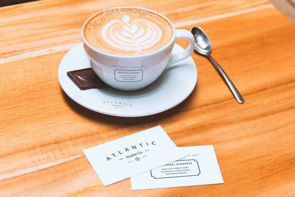 Mockup Showing Two Business Cards and Coffee Cup on Saucer FREE PSD