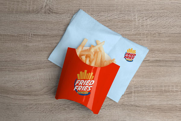 Overhead View of French Fries Package on a Tissue Mockup FREE PSD