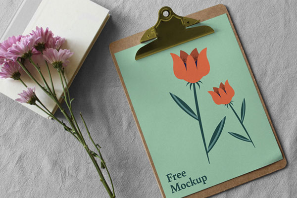 Paper Clipboard Mockup Along With Flowers FREE PSD