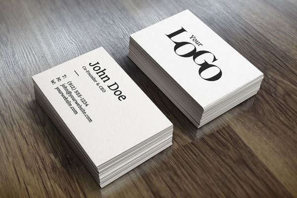 Perspective View of Two Packs of Business Card on Wooden Surface Mockup FREE PSD