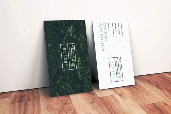 Side View of Two Standing Business Cards against Wall Mockup FREE PSD