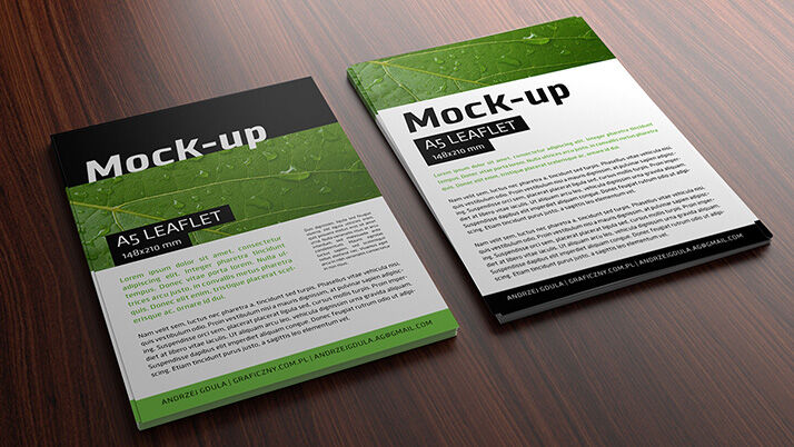 Top Side View of A5 Leaflet Mockup on a Wooden Board FREE PSD