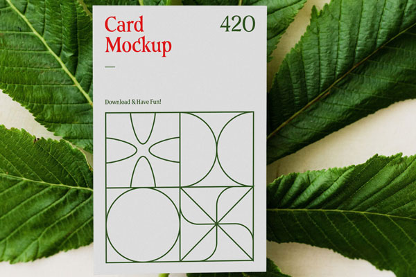 Top View of a Vertical Card on a Leaf Mockup FREE PSD