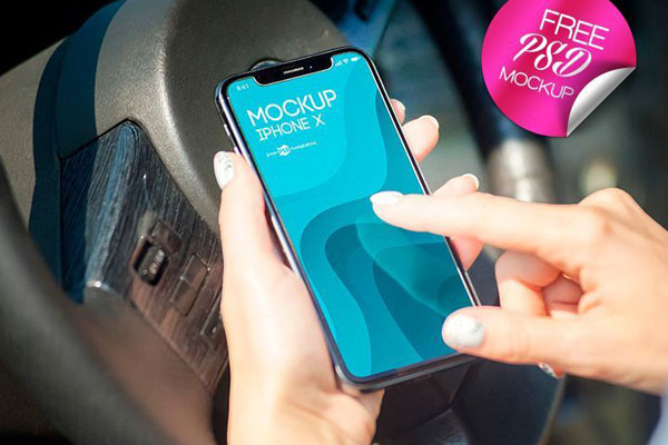 Two iPhone X Screen Mockup in Person's Hand FREE PSD