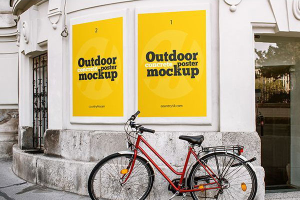 2 Outdoor Concrete Poster Mockups in Urban Setting FREE PSD