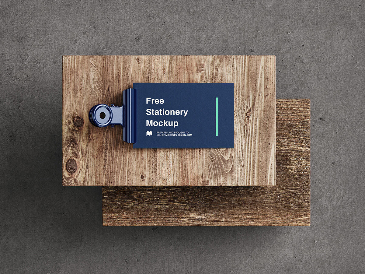 5 Mockups of Stationery in Different Views Featuring Wooden Boards FREE PSD
