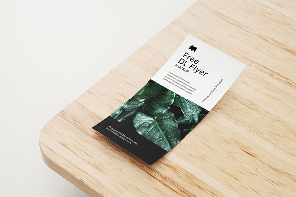 6 Mockups of DL Rack Cards on Wooden Table in Different Views and Positions FREE PSD