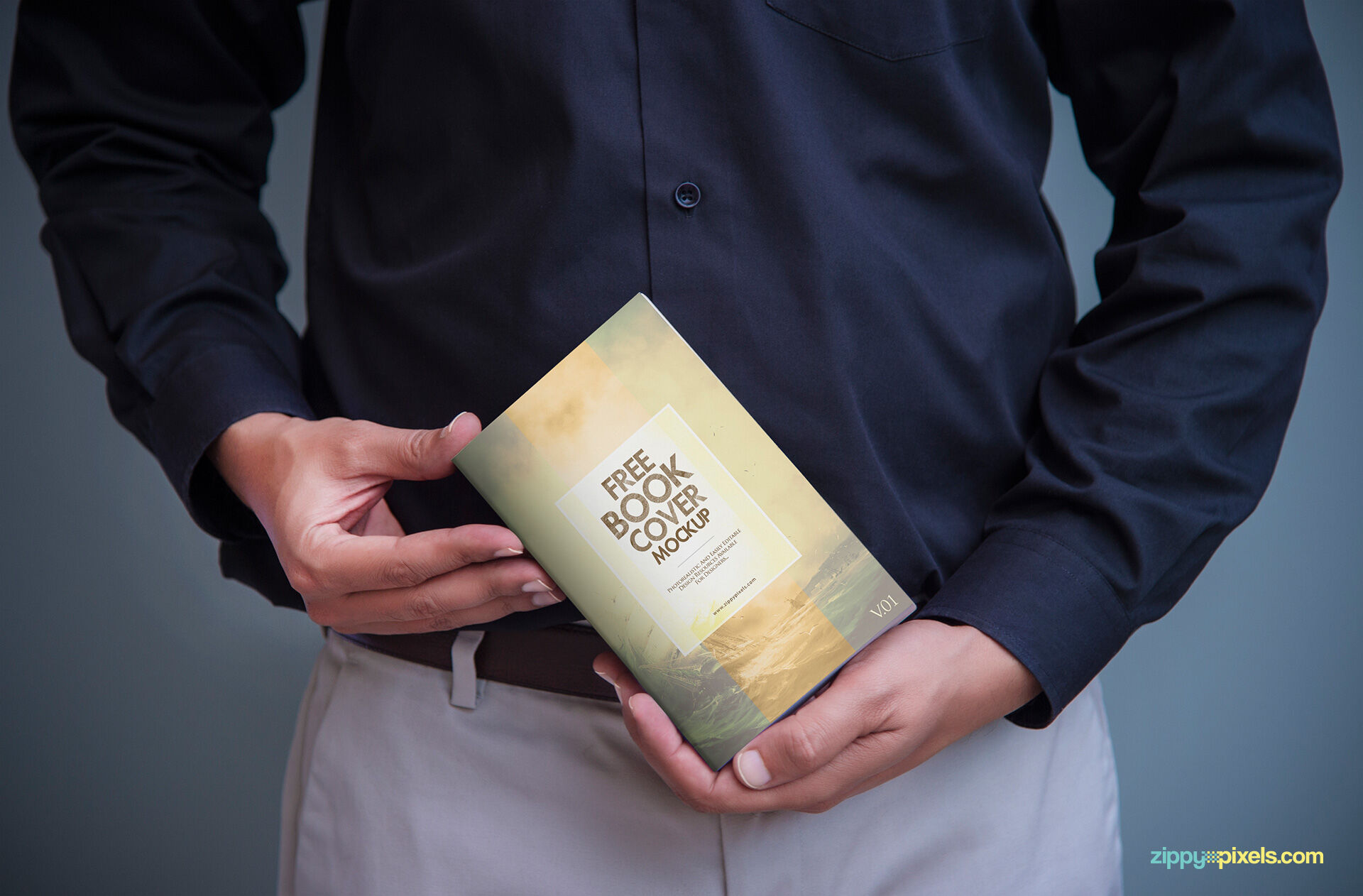 A Book Cover Mockup Held by a Man FREE PSD