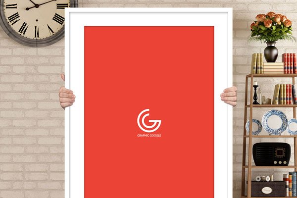 A Man Holding Up Poster in Front of Himself Mockup FREE PSD