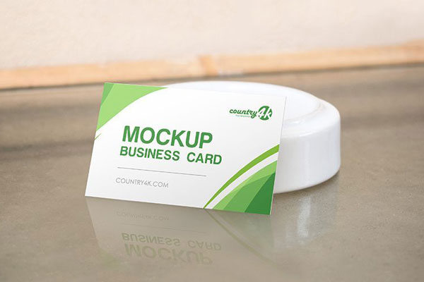 Business Card on the Table in the Half-Side View Mockup FREE PSD
