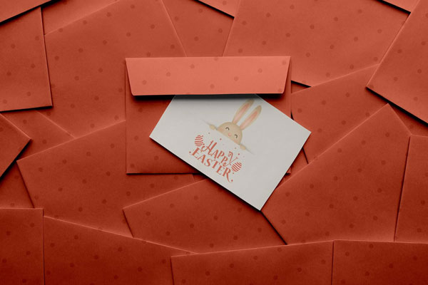 Easter Greeting Card Mockup with Several Envelopes Covering the Floor FREE PSD