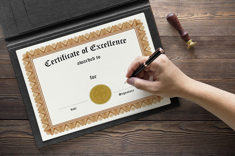 Hand Signing A4 Size Achievement Certificate Mockup FREE PSD