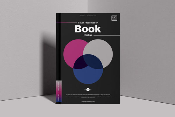 Hardcover Book Standing at the Corner of Two Walls Mockup FREE PSD