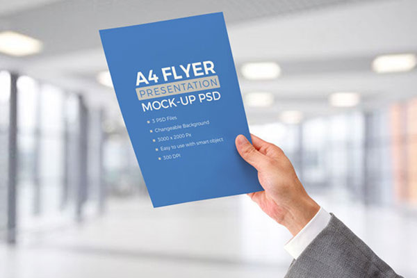 Male Hand Holding A4 Letterhead Paper Mockup FREE PSD