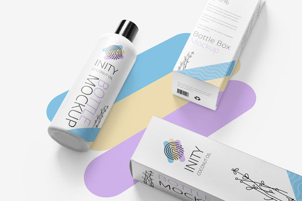 Matte Bottle Mockup Along with Two Packaging Boxes Laid in Perspective FREE PSD