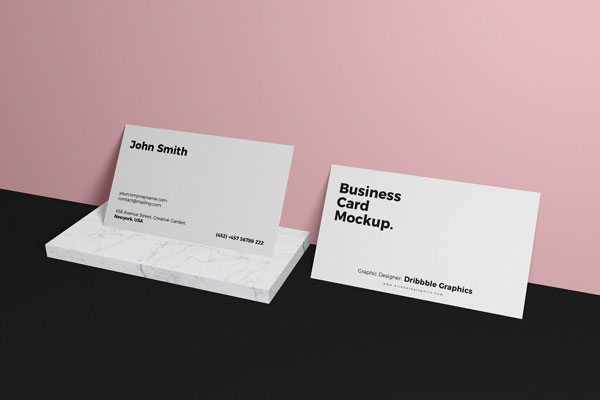 Mockup Featuring 2 Business Cards Relying on Wall FREE PSD