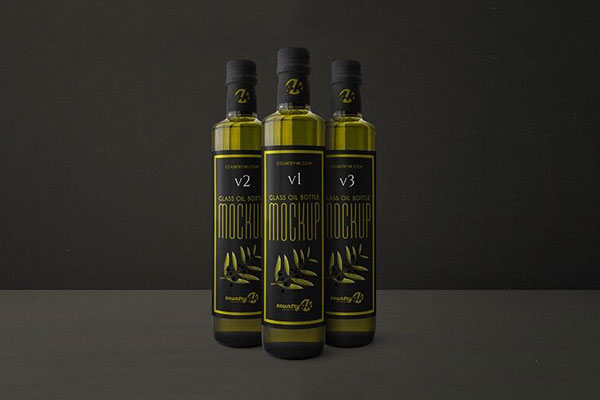 Mockup Featuring Three Slim, Glass Oil Bottles in Front View FREE PSD