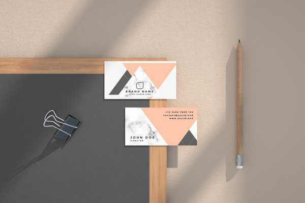 Mockup Featuring Two Business Cards on a Blackboard in Top View FREE PSD