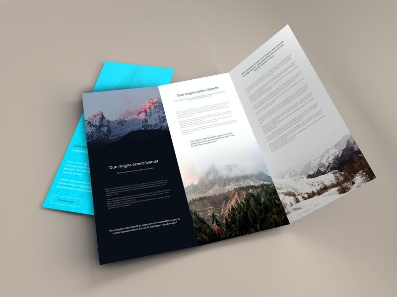 Mockup Featuring Two Tri-Fold Brochures Laid at the 3\4 Angle View Free ...