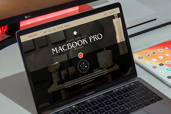 Mockup of a Macbook Pro Placed in a Realistic Workspace FREE PSD