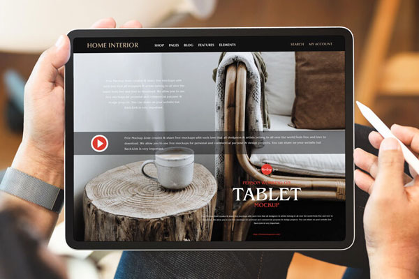 Mockup of a Person Using Tablet FREE PSD