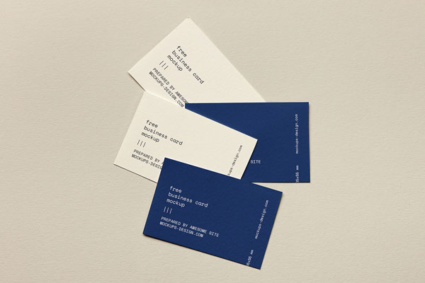 Mockup of Business Cards Lying On Paper FREE PSD