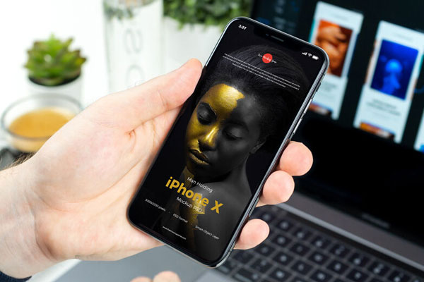 Mockup Showcasing Man Holding iPhone X FREE PSD