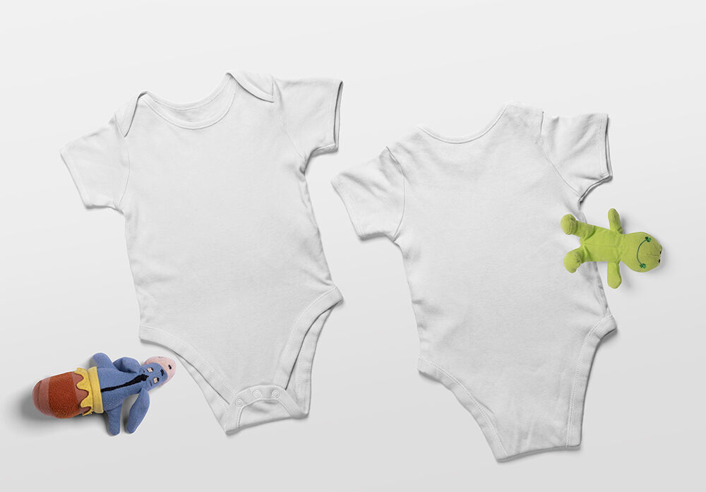 Overhead View of Back and Front Sides of Baby Onesie Mockup FREE PSD