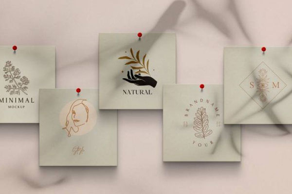 Overhead View of Five Square Papers Pinned to Wall Mockup FREE PSD