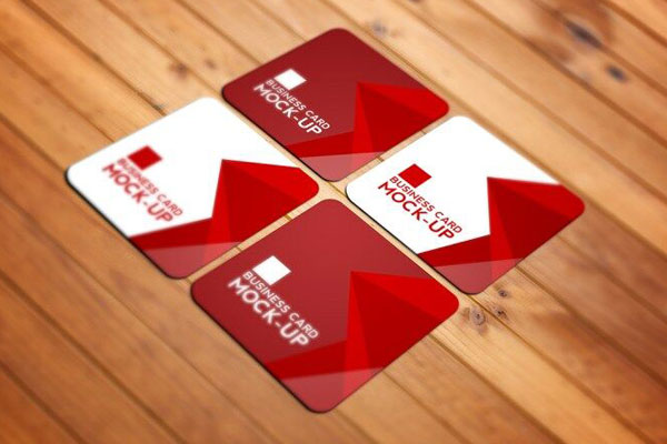 Perspective View of Four Square Business Cards on Wooden Texture Mockup FREE PSD