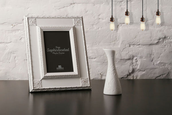 Perspective View of Photo Frame on Table Mockup FREE PSD