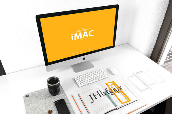 Perspective View Workspace iMac Mockup with Books and Smartphone FREE PSD