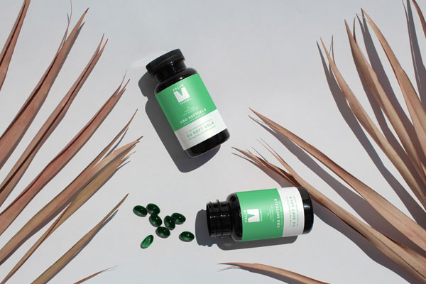 Top View Mockup of Two Soft Capsule Bottles on Floor FREE PSD