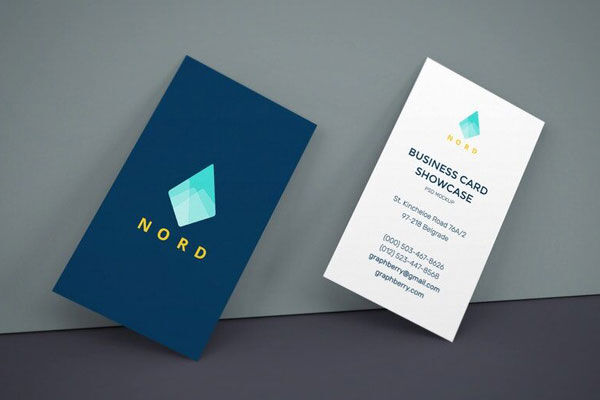 Two Business Cards Leaning Against The Wall Mockup FREE PSD