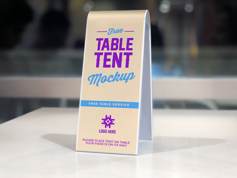 Two-Sided Plastic Table Tent on White Table Mockup FREE PSD