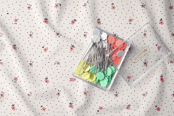Wavy Piece of Fabric Mockup in Top View Featuring Sewing Pins FREE PSD