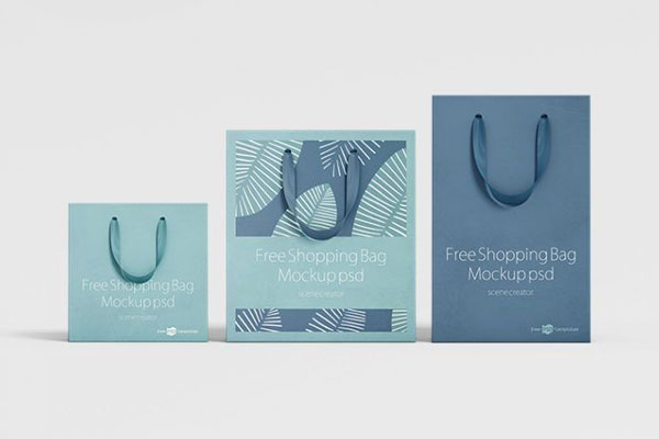 3 Shopping Bag Mockups Standing in Front and Half-Side Views FREE PSD