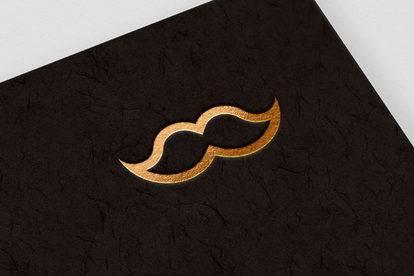 Embossed, Gold Foil Logo on Textured Background in Perspective Mockup FREE PSD