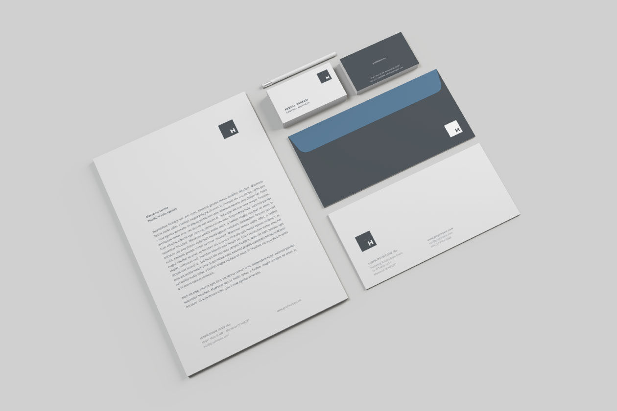 Five Mockups Featuring Business Cards, Letterheads, envelops and CD Cover FREE PSD