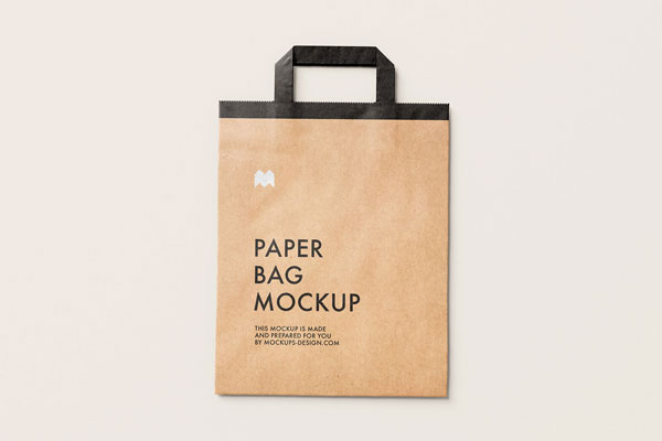 Four Mockups Showing Overhead and Perspective View of Flattened Paper Bags FREE PSD