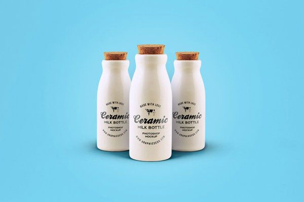 Front View of Three Ceramic Bottles Mockup with Cork Lids FREE PSD
