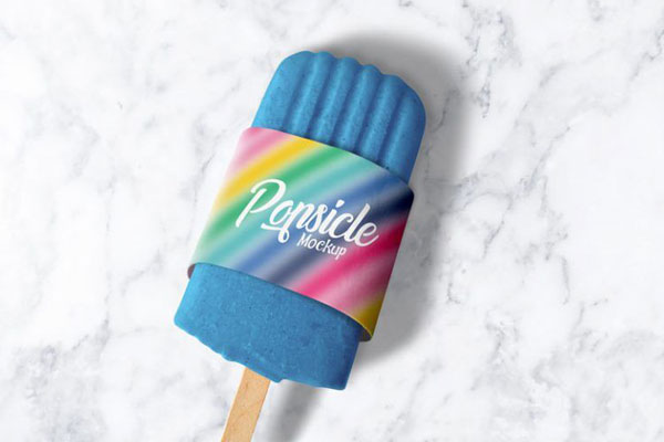 Ice Popsicle in Packaging Sleeve Laid in the Top View Mockup FREE PSD
