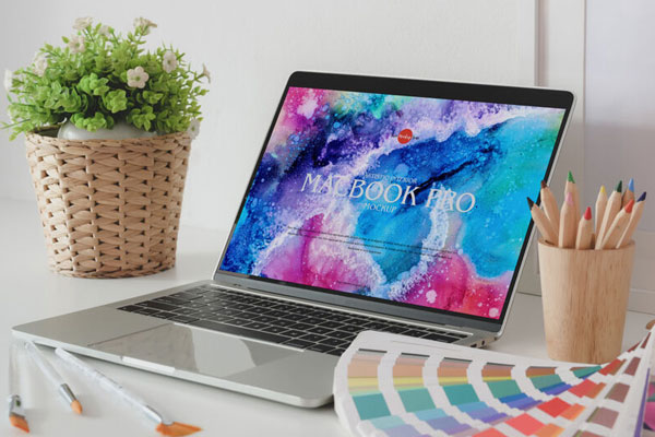 MacBook Pro Mockup Opened on a Desk in Half-Side View FREE PSD