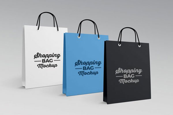 Mockup of Three Paper Shopping Bags FREE PSD