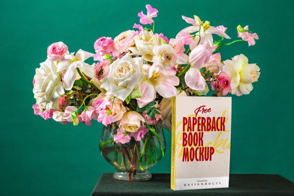 Paperback Book Cover and Spine Mockup on Table with a Glass Vase FREE PSD